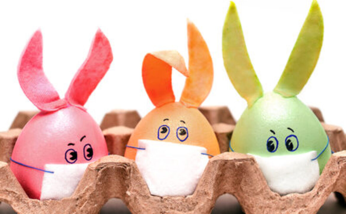 Three,Multicolored,Easter,Eggs,With,Painted,Eyes,,Rabbit,Ears,And
