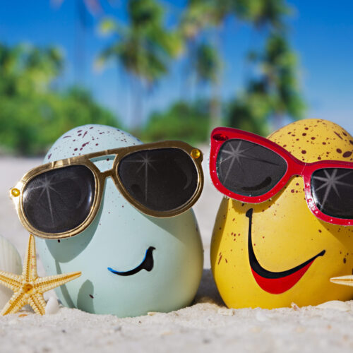 Happy,Easter,Eggs,With,Sunglasses,On,Ocean,Beach Happy,Easter,Eggs,With,Sunglasses,On,Ocean,Beach