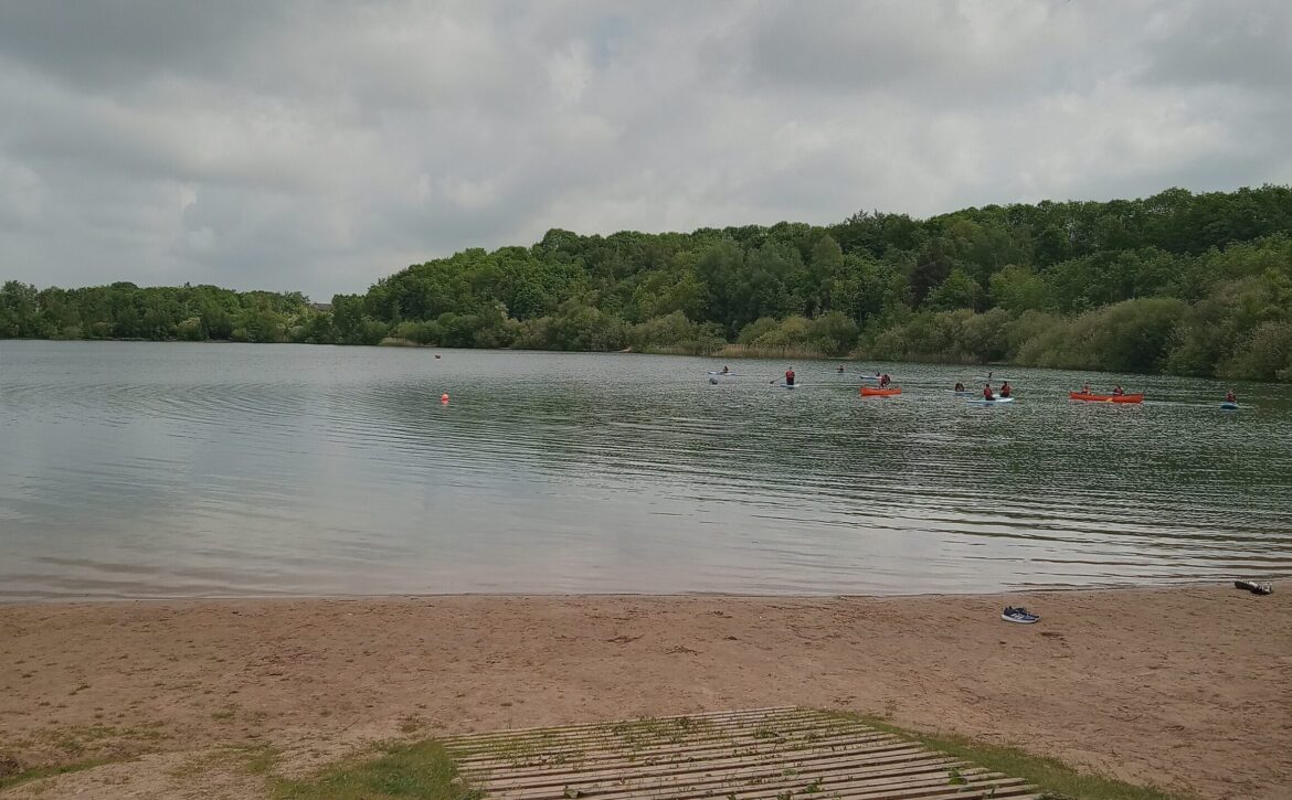 View of Astbury mere and surrounding woodland