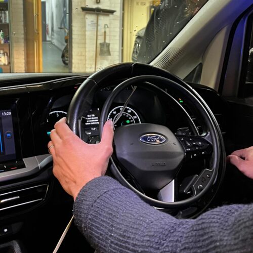 Bluetooth Steering Ring Picture of a steering wheel adapted for a disabled driver.